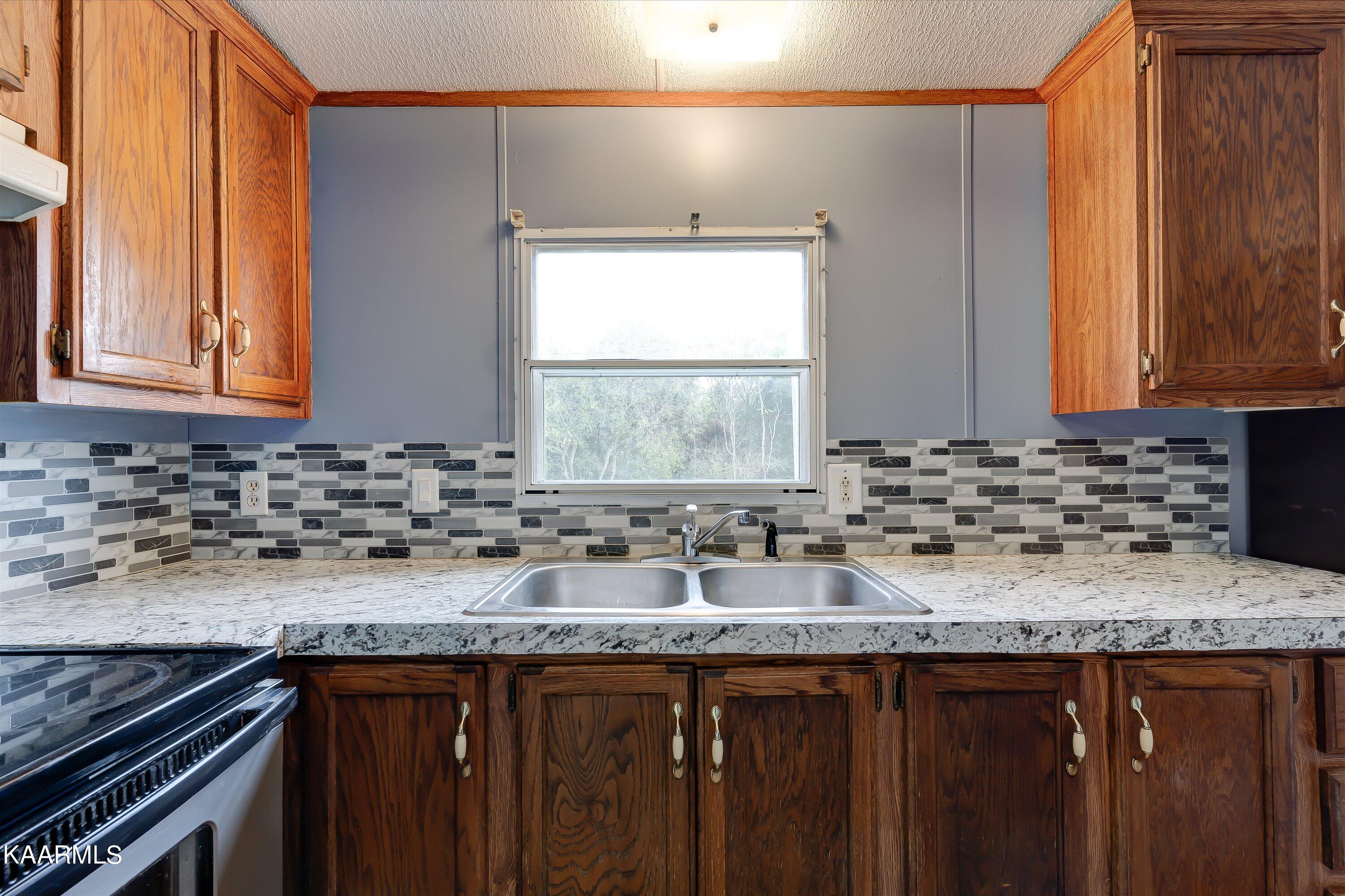 2641 Reed Springs Road Sweetwater, TN 37874 - Photo 9 of 32 Kitchen window overlooking backyard