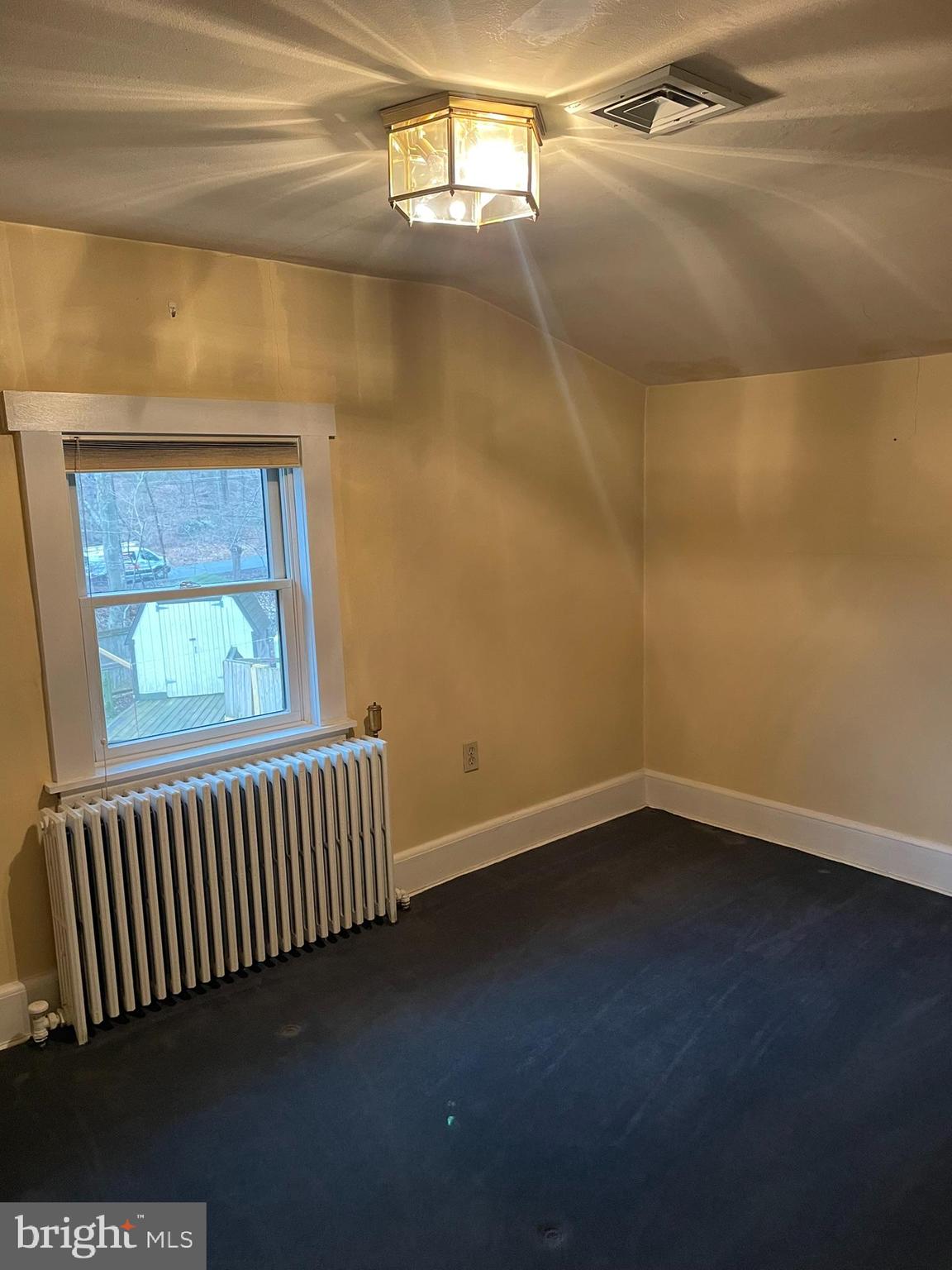 1127 Kaolin Road Avondale, PA 19311 - Photo 23 of 31 a view of an empty room with a window