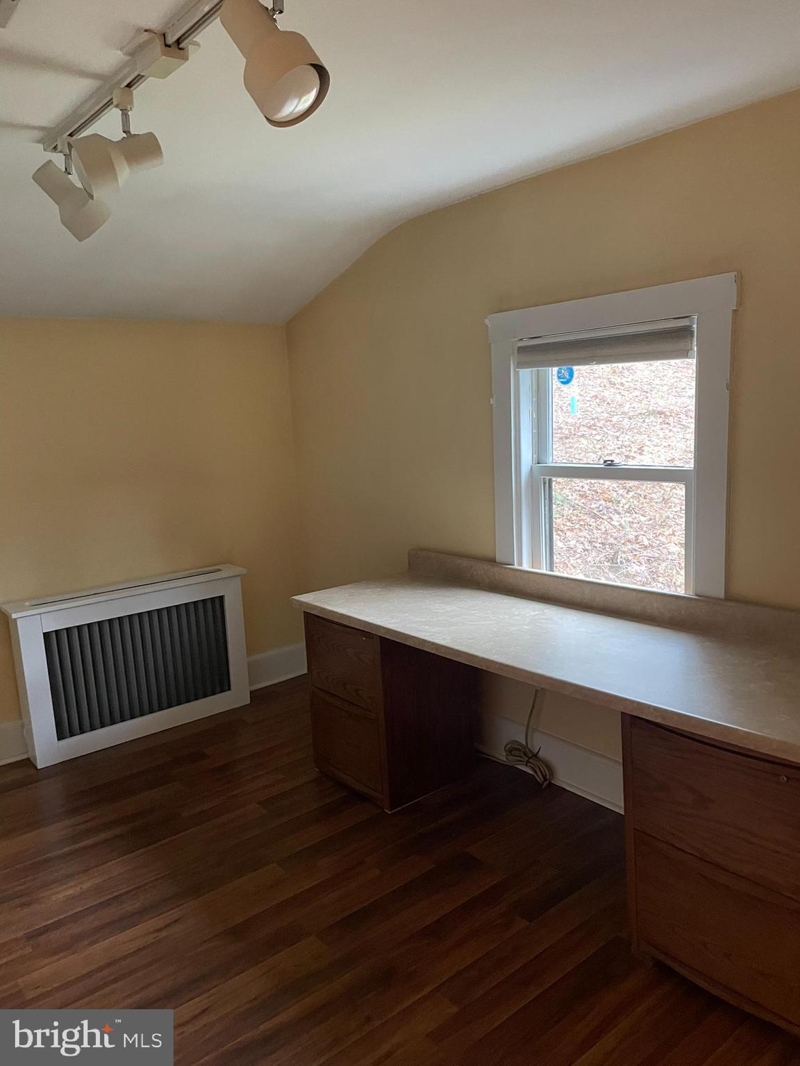 1127 Kaolin Road Avondale, PA 19311 - Photo 26 of 31 a room with wooden floor and windows