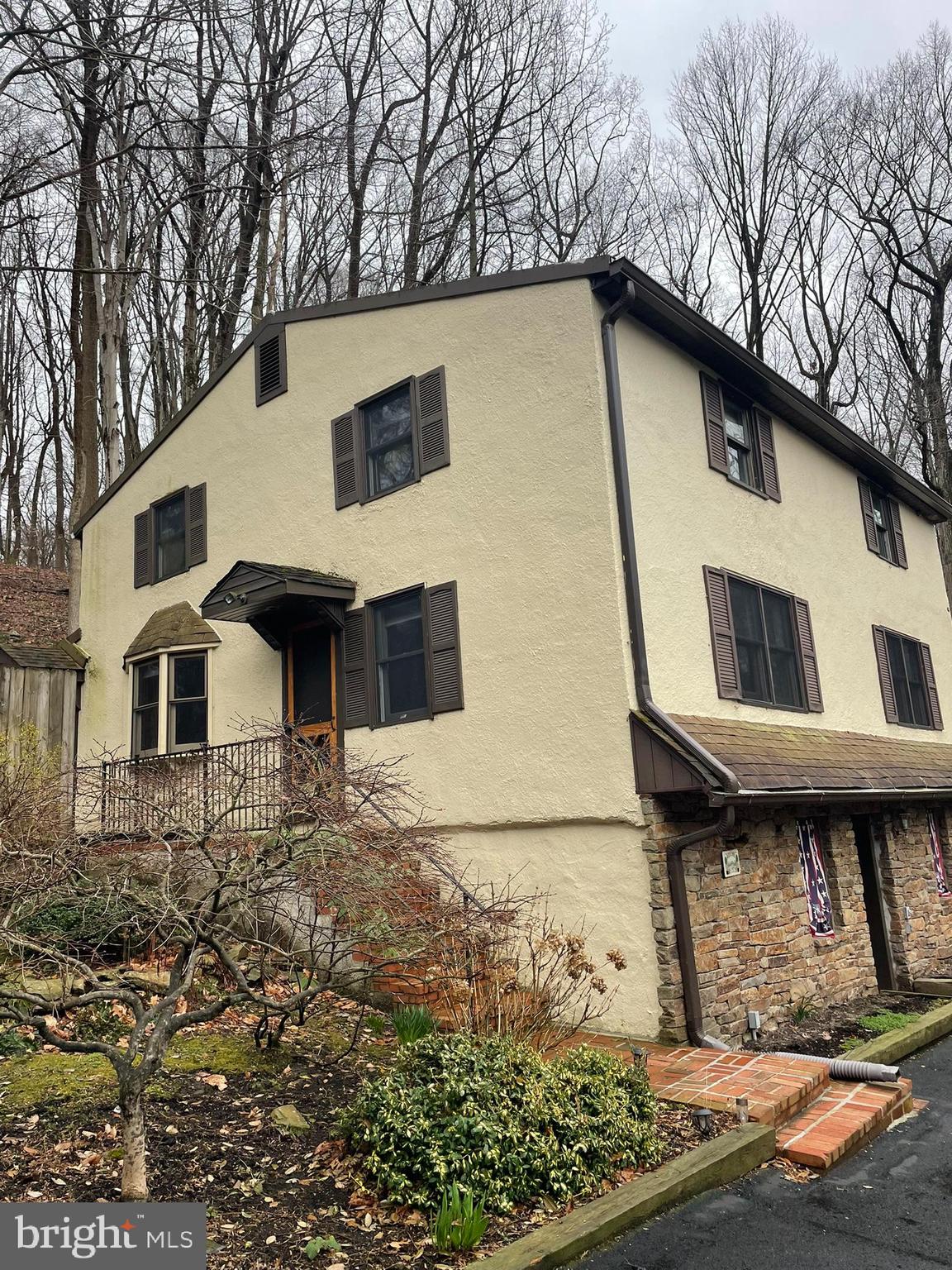 1127 Kaolin Road Avondale, PA 19311 - Photo 6 of 31 a house with trees in front of it