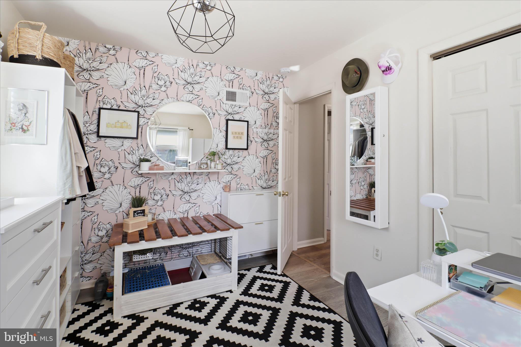 213 Skylark Road Lititz, PA 17543 - Photo 22 of 54 a kitchen with stainless steel appliances granite countertop a stove and a wooden floor