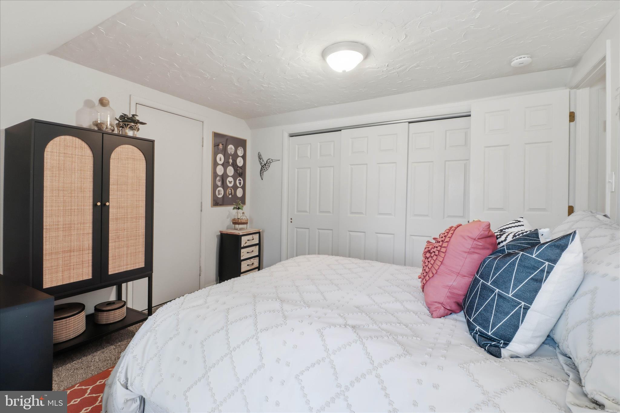 213 Skylark Road Lititz, PA 17543 - Photo 24 of 54 a bedroom with a bed and a flat tv screen