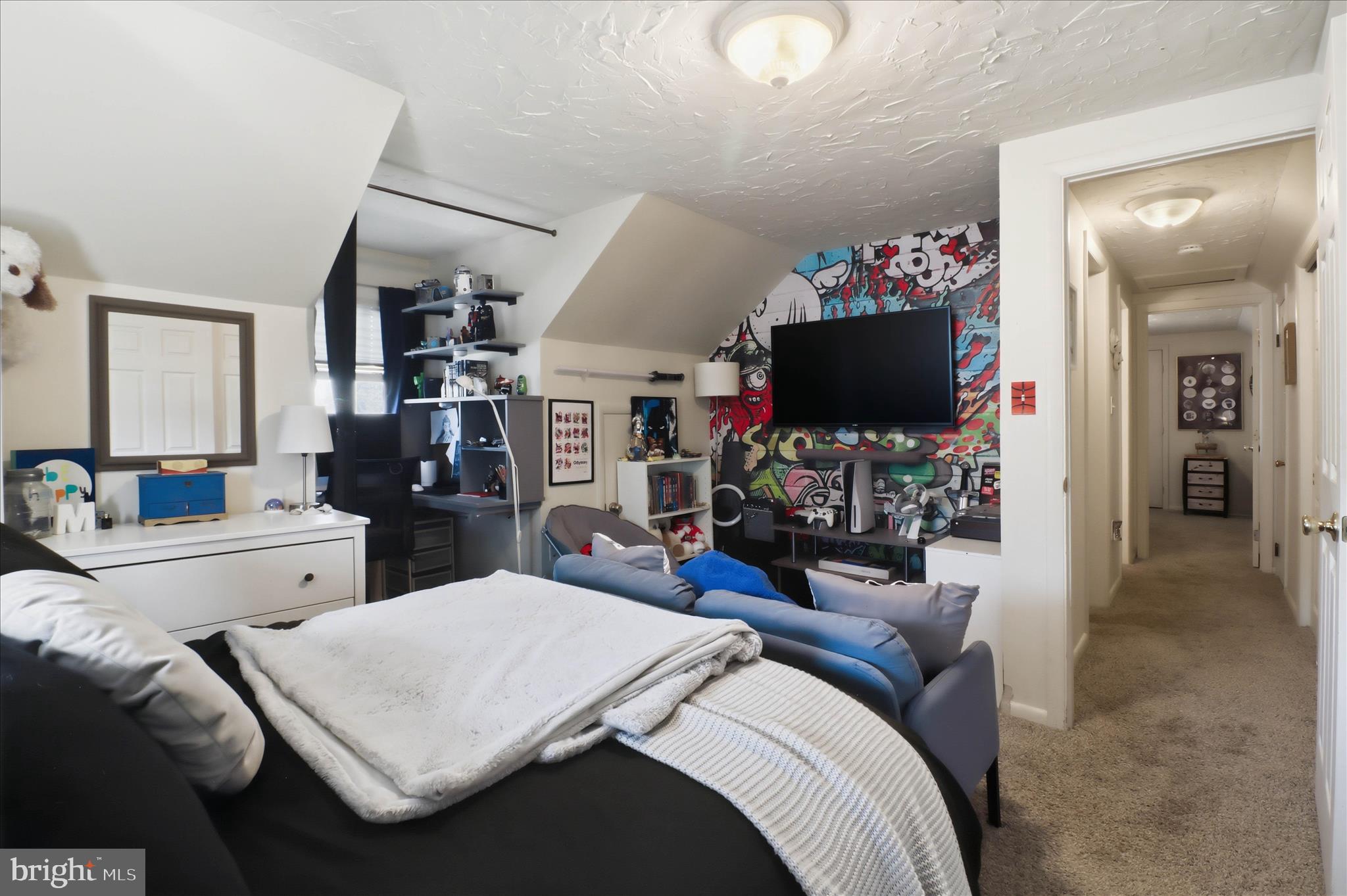 213 Skylark Road Lititz, PA 17543 - Photo 28 of 54 a bed room with a bed mirror and a flat screen tv