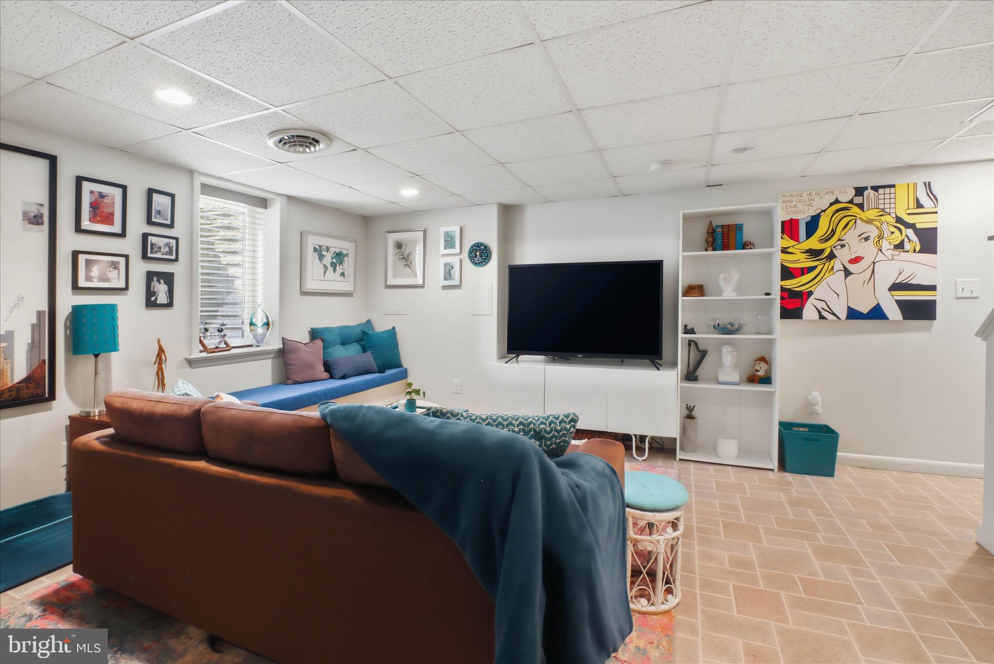213 Skylark Road Lititz, PA 17543 - Photo 35 of 54 a living room with furniture and a flat screen tv