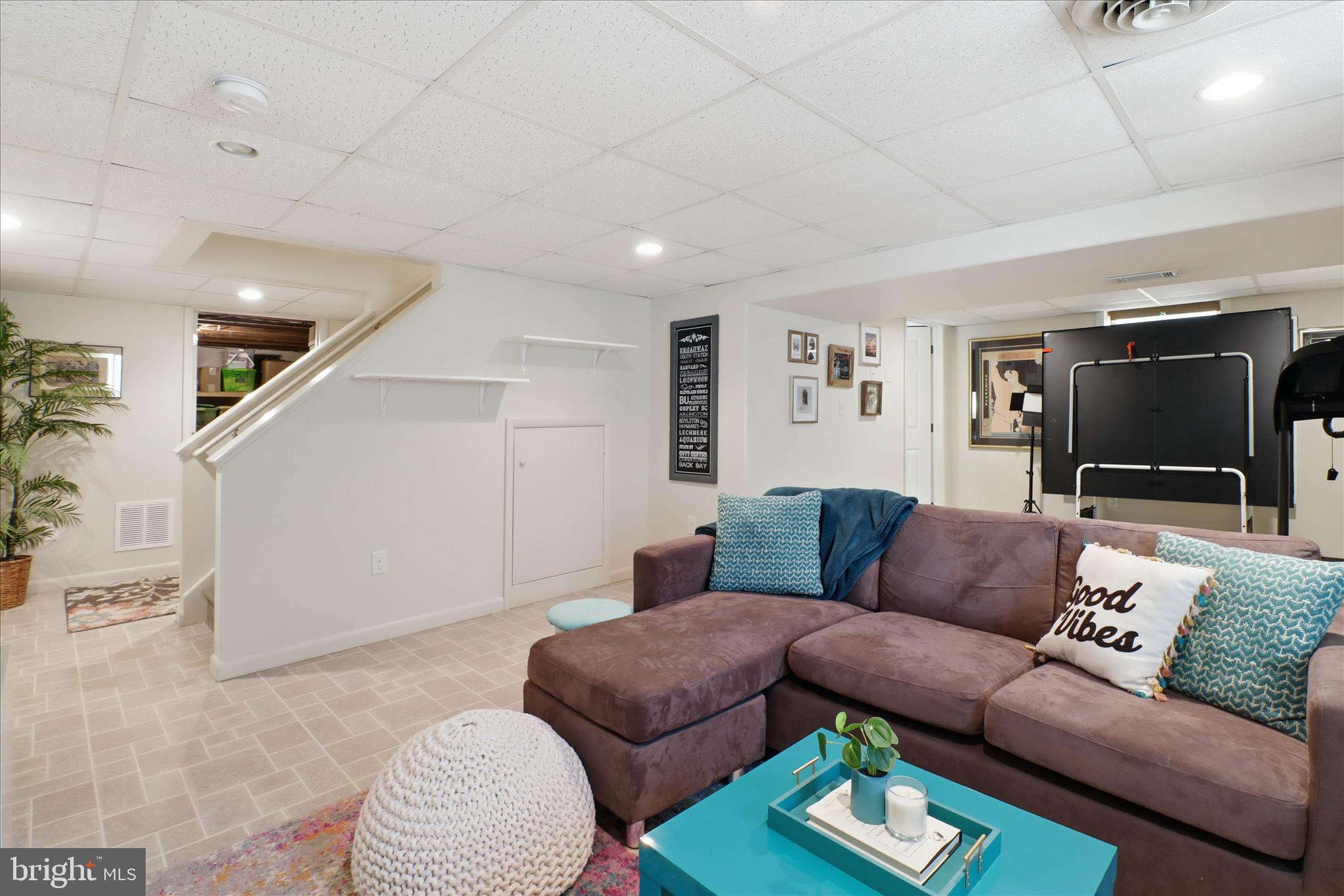 213 Skylark Road Lititz, PA 17543 - Photo 36 of 54 a living room with furniture and a flat screen tv