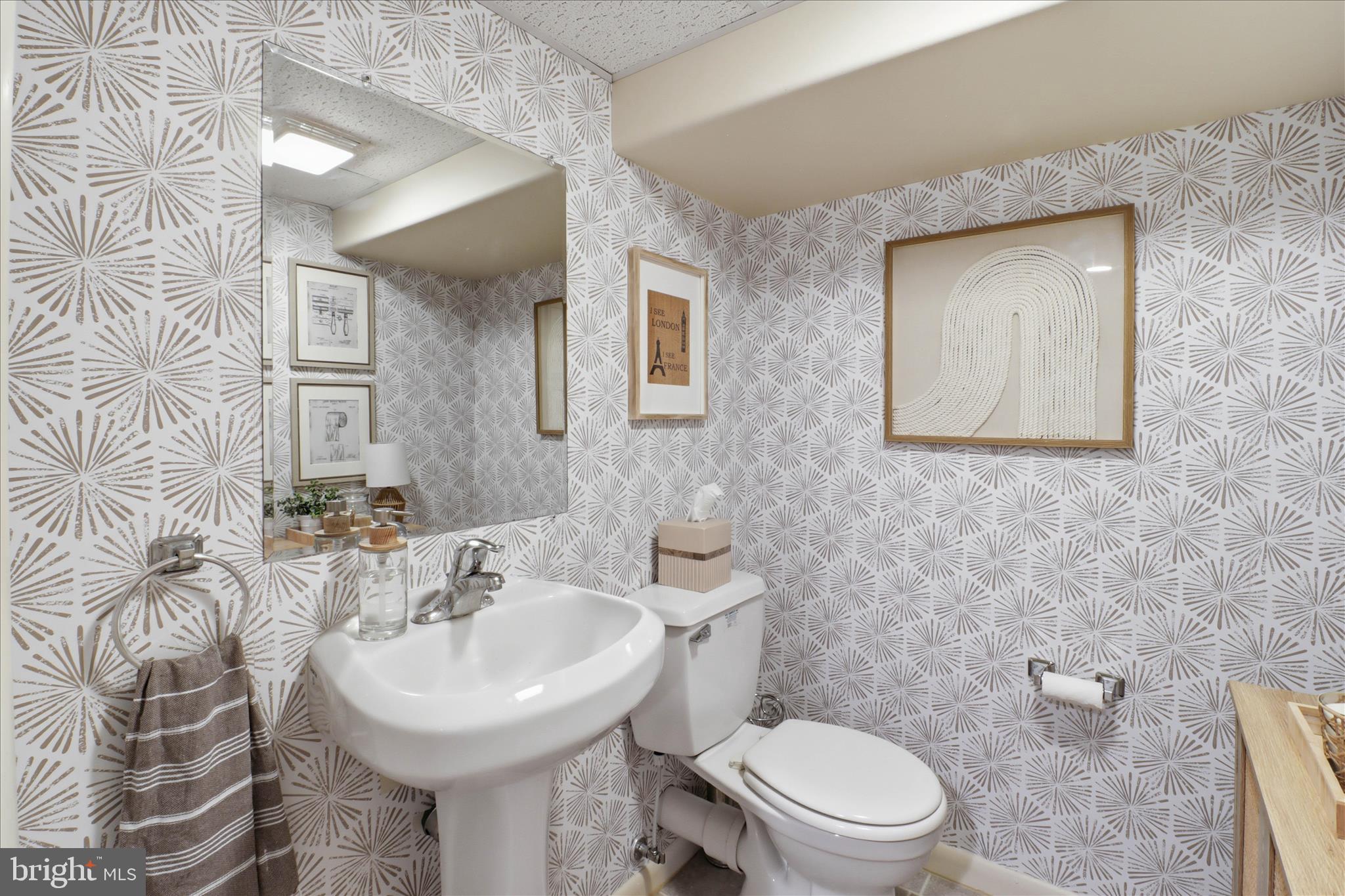 213 Skylark Road Lititz, PA 17543 - Photo 37 of 54 a bathroom with a sink toilet and mirror