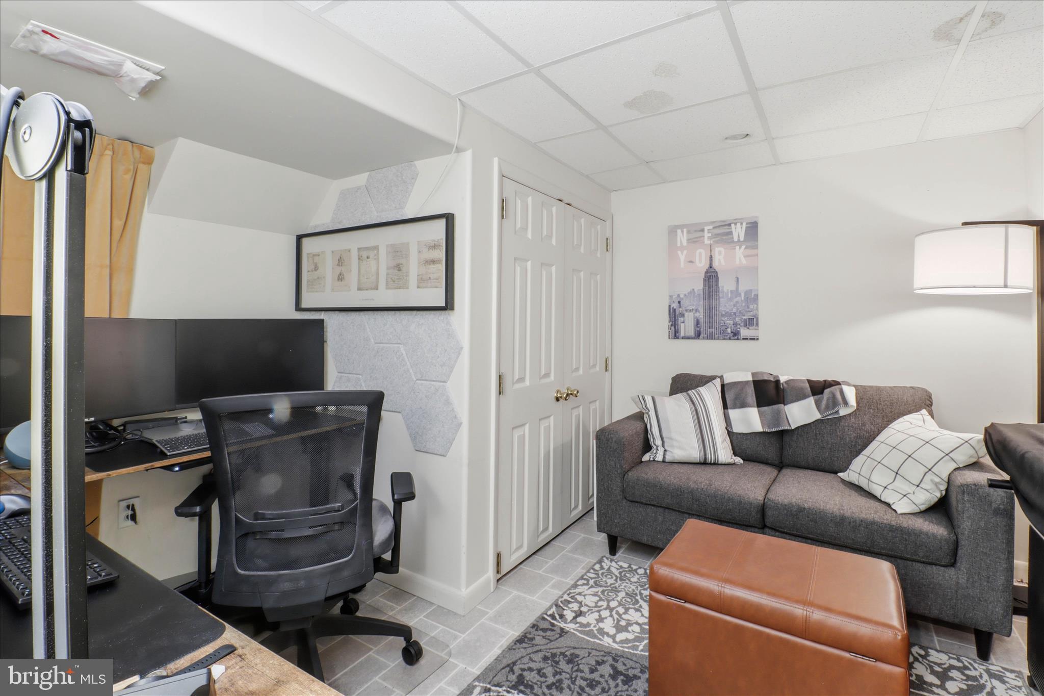 213 Skylark Road Lititz, PA 17543 - Photo 40 of 54 a living room with furniture and a flat screen tv