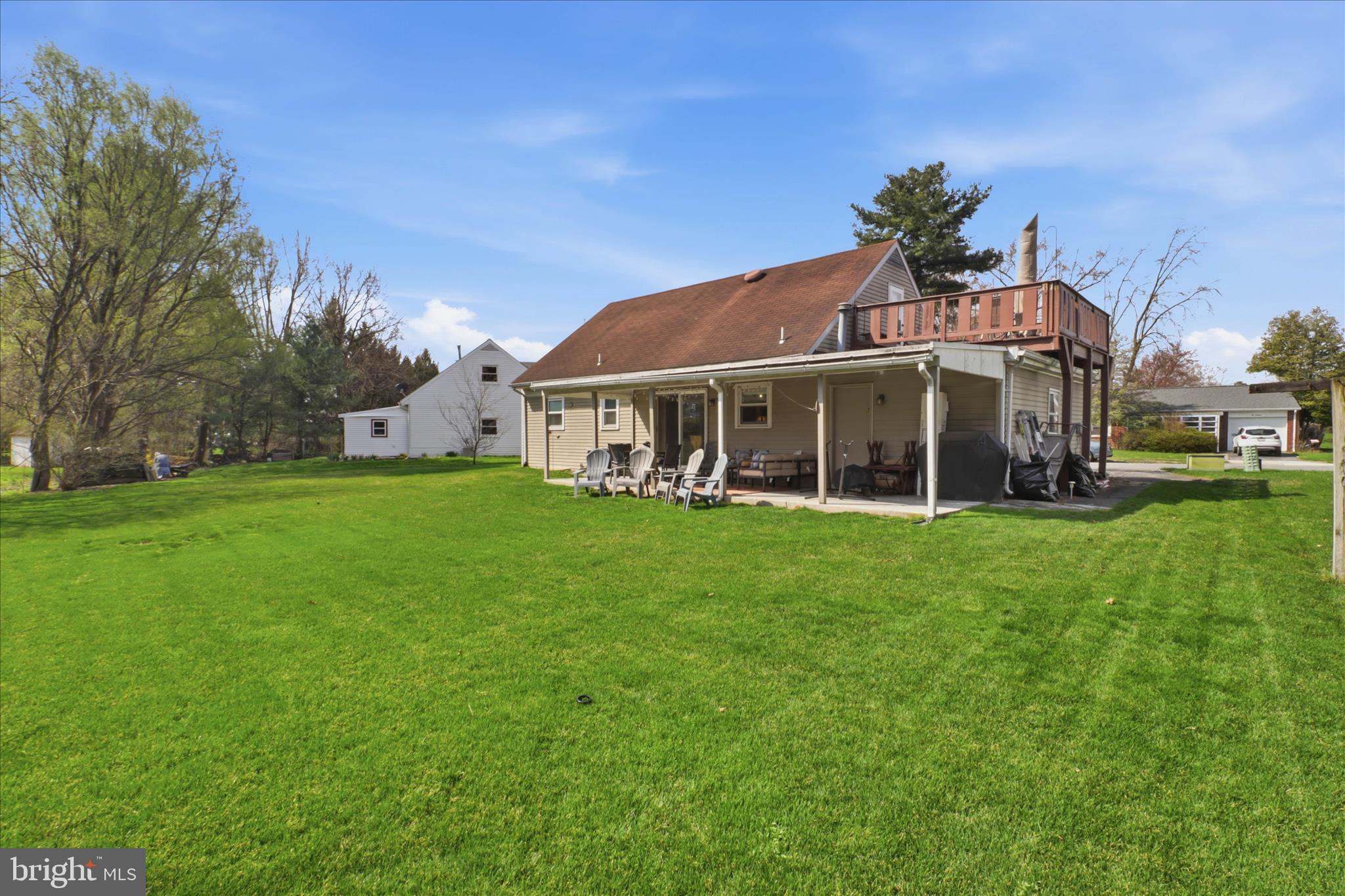 213 Skylark Road Lititz, PA 17543 - Photo 47 of 54 a front view of a house with a garden and plants