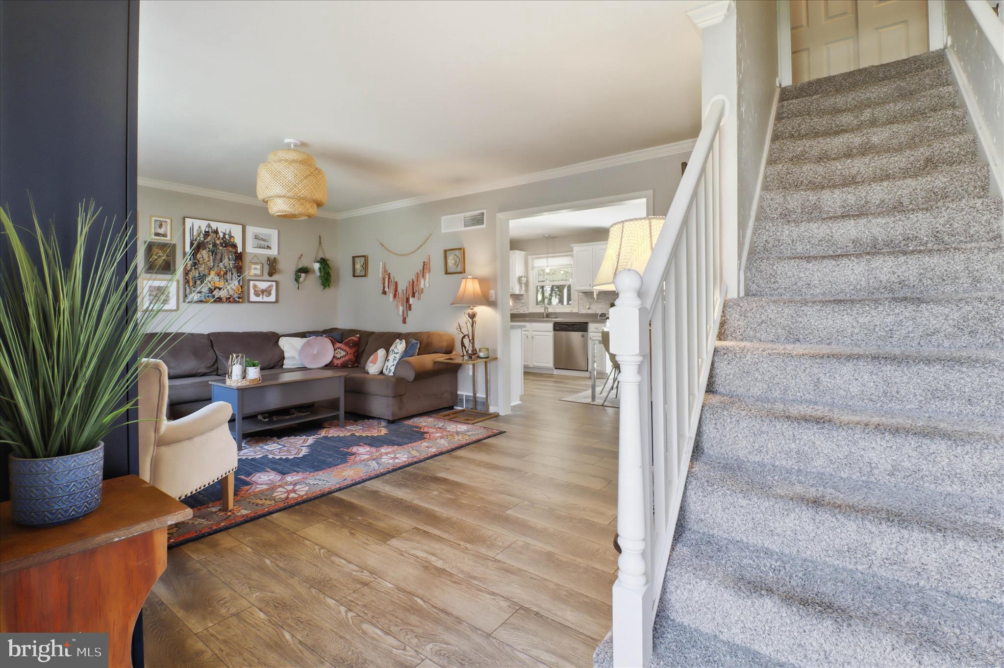 213 Skylark Road Lititz, PA 17543 - Photo 6 of 54 a living room with furniture and a potted plant