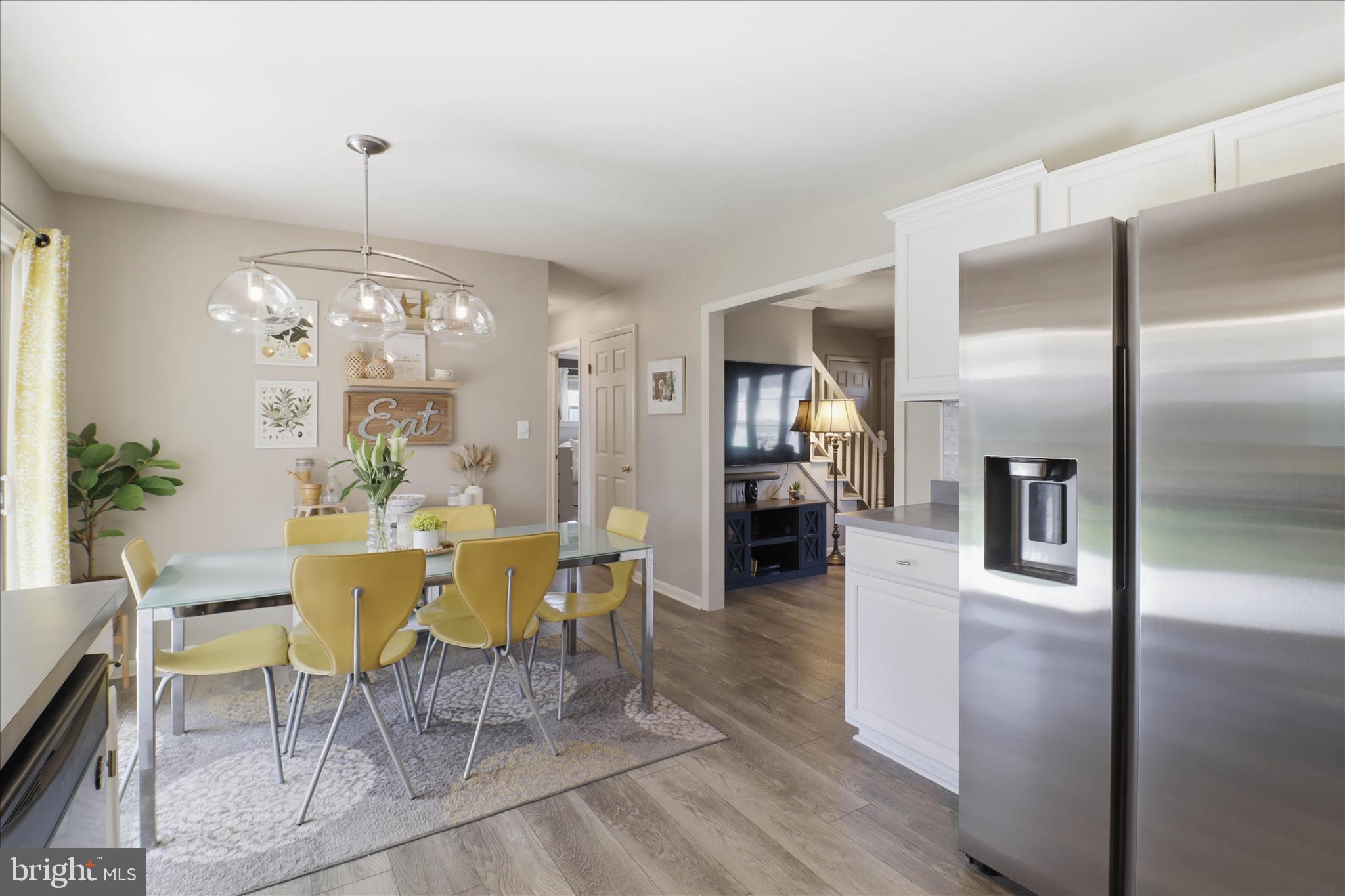 213 Skylark Road Lititz, PA 17543 - Photo 8 of 54 a view of a dining room with furniture window and wooden floor