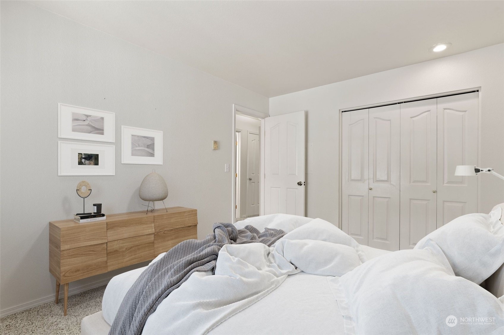 1830 South 336th Street, Unit C201 Federal Way, WA 98003 - Photo 19 of 30 a bedroom with a bed and a couch