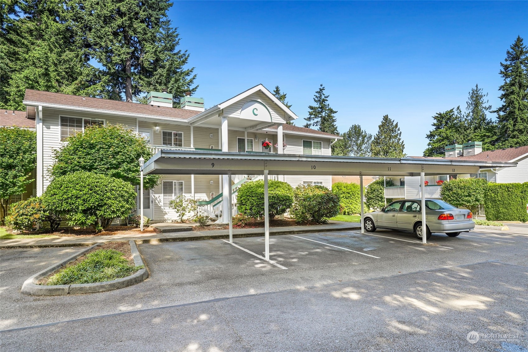 1830 South 336th Street, Unit C201 Federal Way, WA 98003 - Photo 24 of 30 a view of front of house with a street