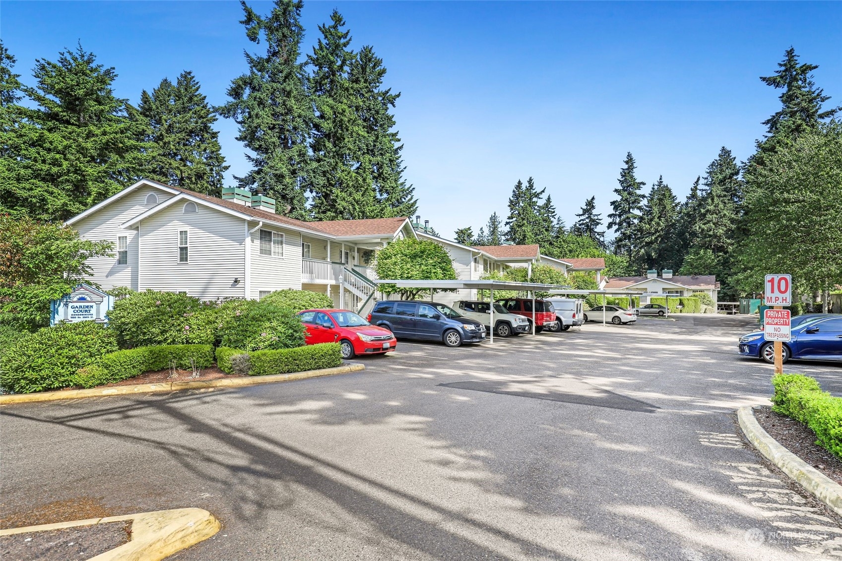 1830 South 336th Street, Unit C201 Federal Way, WA 98003 - Photo 25 of 30 a view of the house and outdoor space