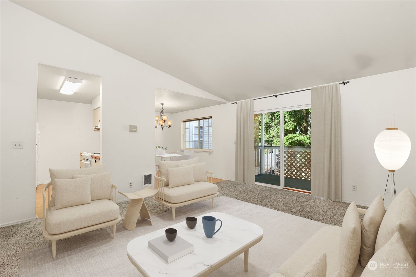 1830 South 336th Street, Unit C201 Federal Way, WA 98003 - Photo 8 of 30 a living room with furniture and a large window