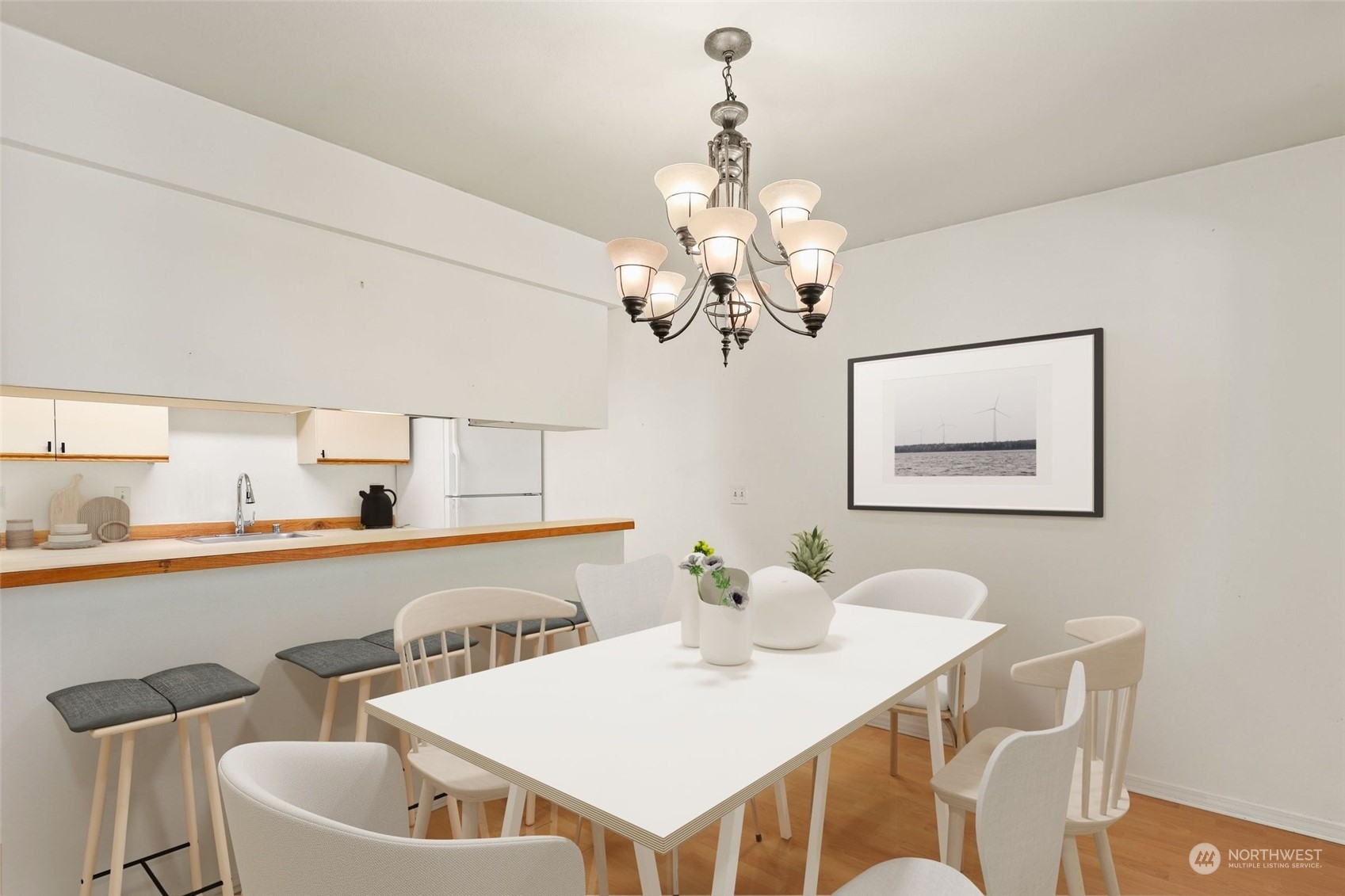 1830 South 336th Street, Unit C201 Federal Way, WA 98003 - Photo 10 of 30 a view of a dining room with furniture and chandelier