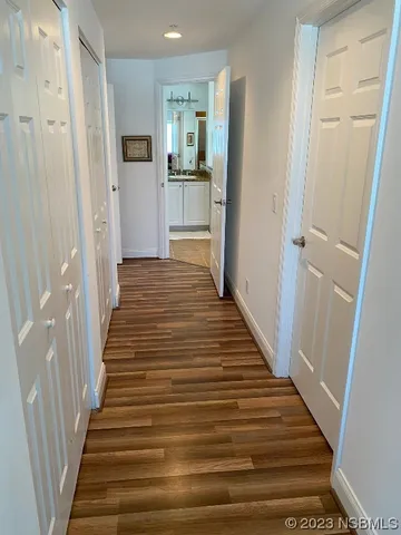 a bath tub sitting next to a bathroom sink