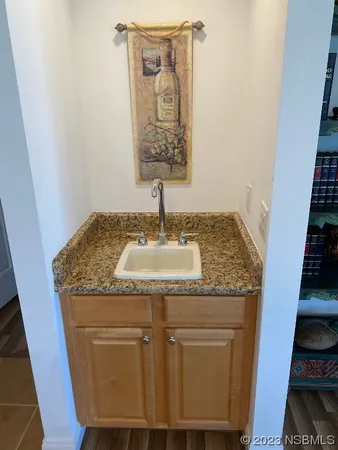 a front view of residential houses with yard