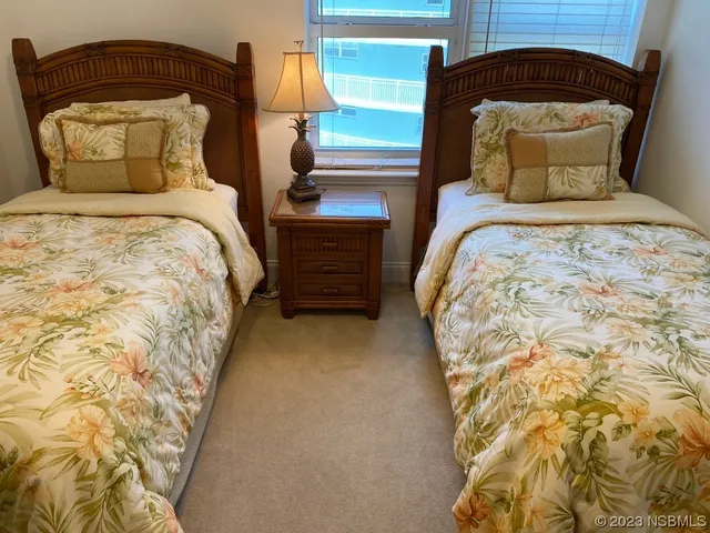 a view of a hallway and interior of the house