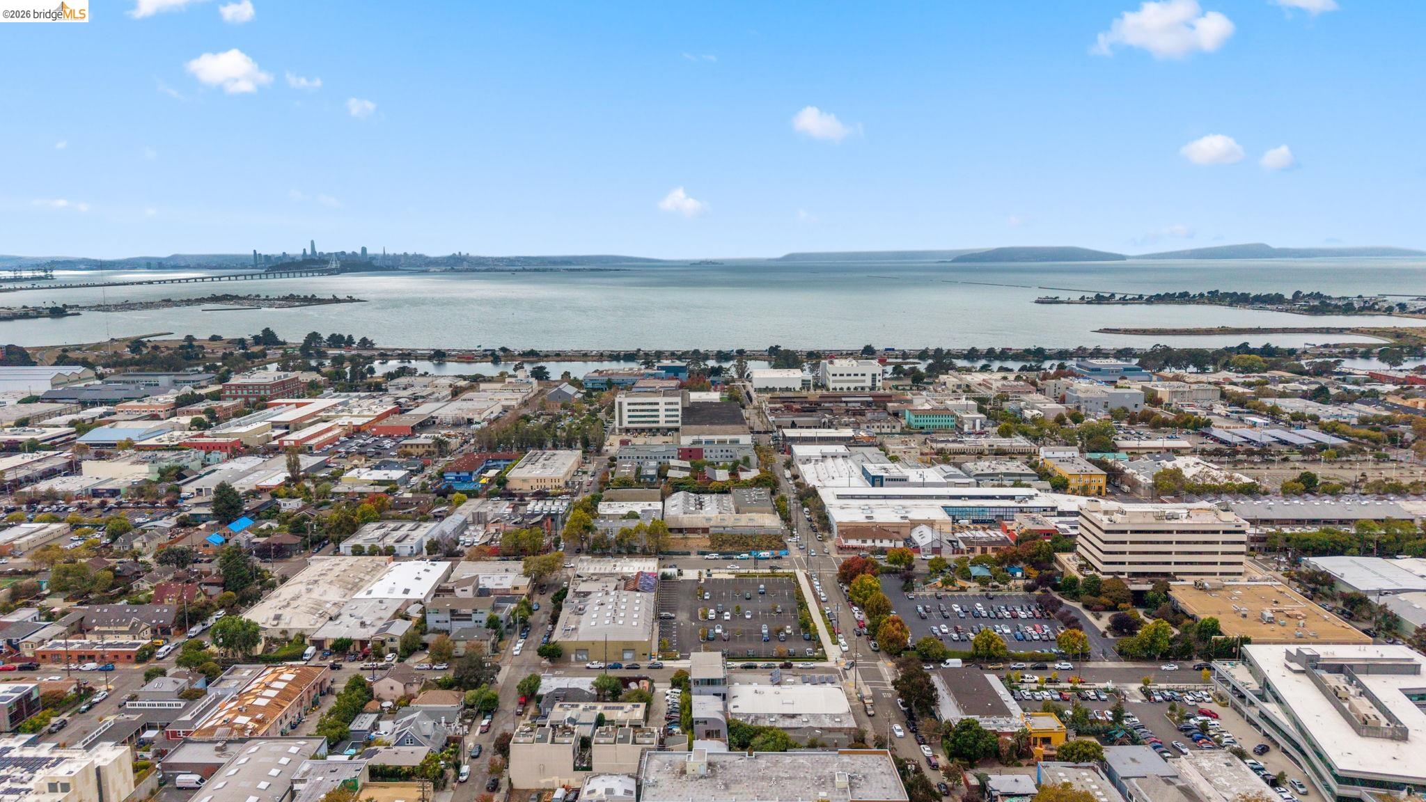 2709 Tenth Street, Unit D Berkeley, CA 94710 - Photo 29 of 29 Expansive urban landscape with a prominent waterfront, distant bridge, and city skyline