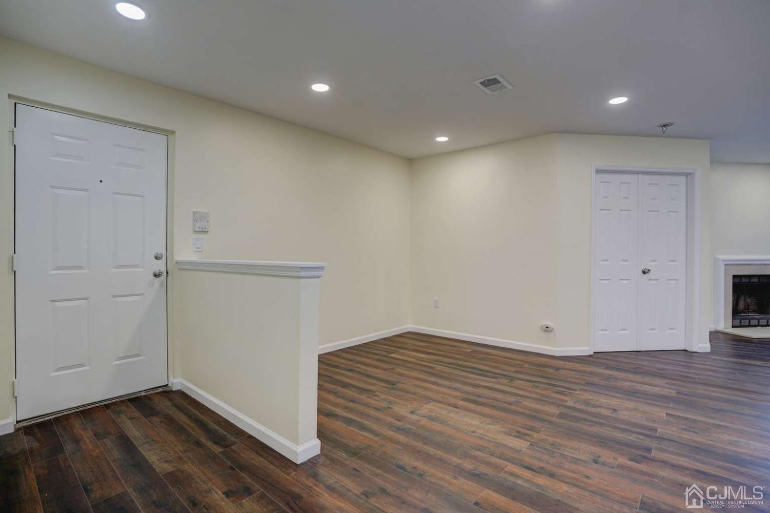 124 Edpas Road New Brunswick, NJ 08901 - Photo 5 of 24 a view of room with wooden floor