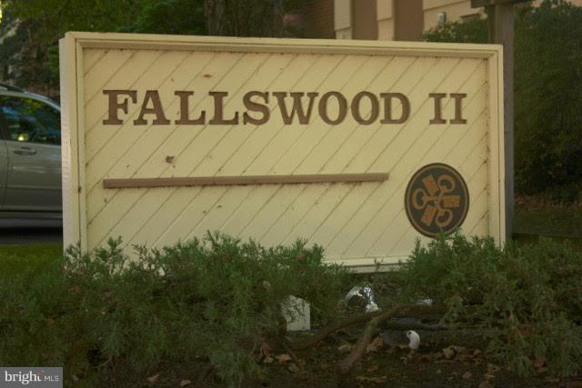 7 Hamill Road, Unit 7B Baltimore, MD 21210 - Photo 1 of 14 a sign that is on a wooden wall