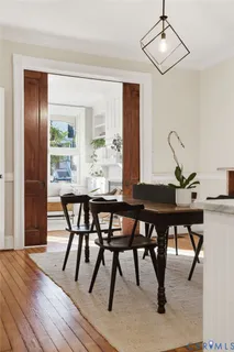 a bedroom with a bed and a chair