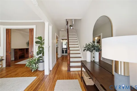 a view of a living room and dining room