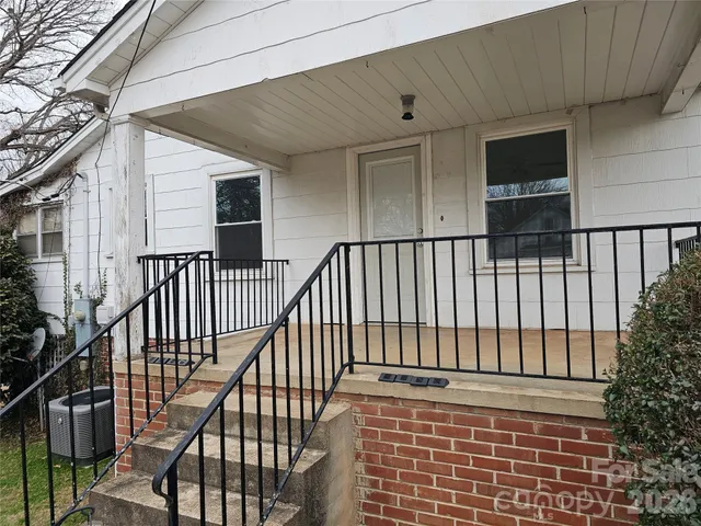 a view of balcony with wooden floor