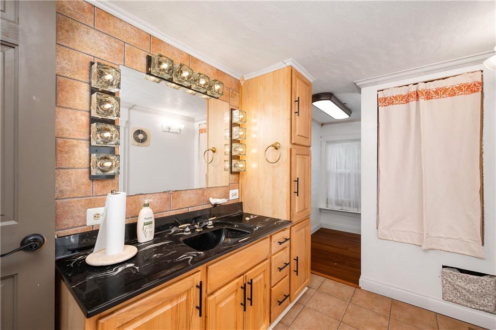 438 Main Street Prospect, PA 16052 - Photo 28 of 46 a kitchen with stainless steel appliances granite countertop a stove and a refrigerator