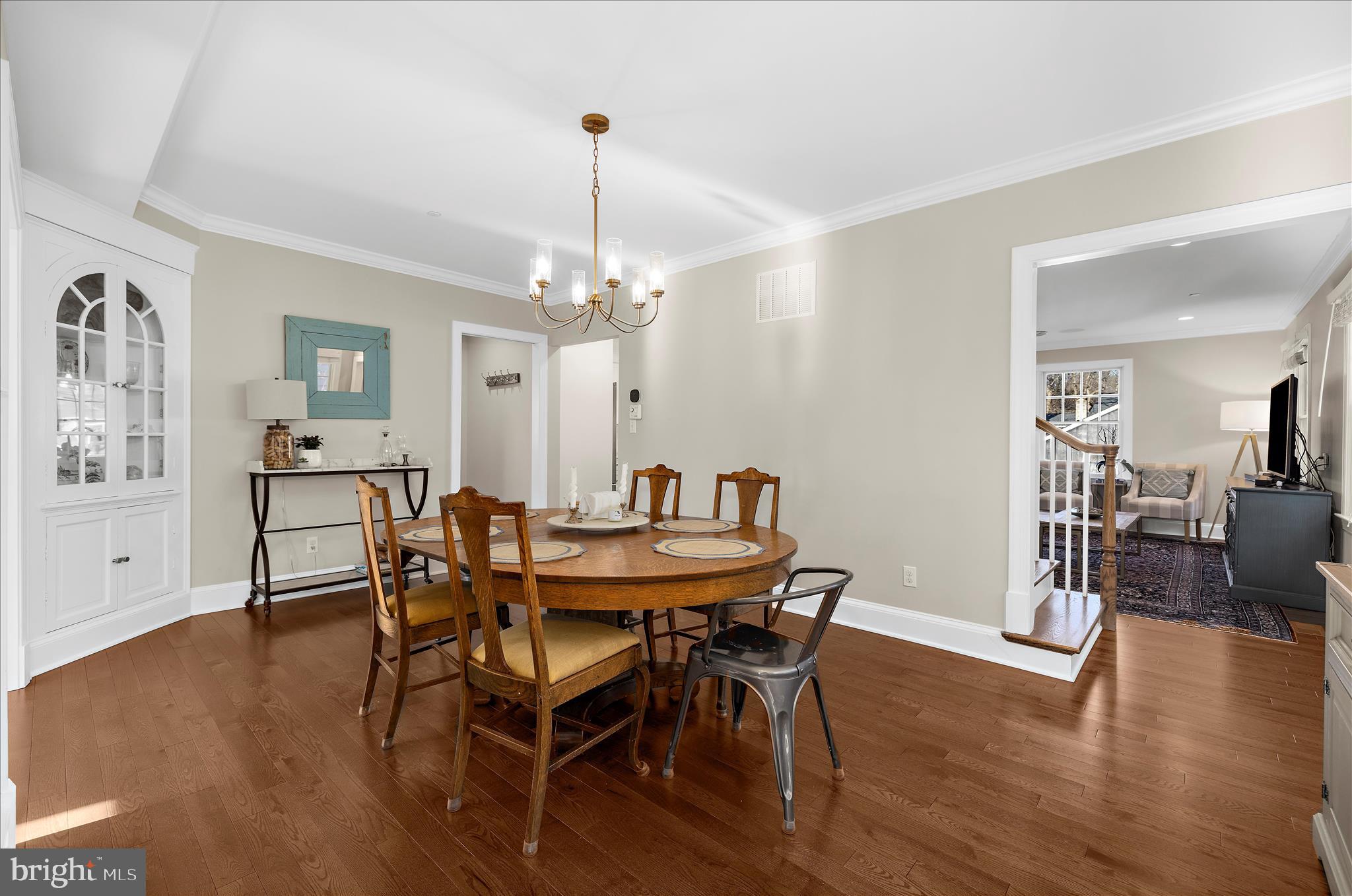 1102 Poplar Avenue Annapolis, MD 21401 - Photo 11 of 125 a view of a dining room with furniture and wooden floor