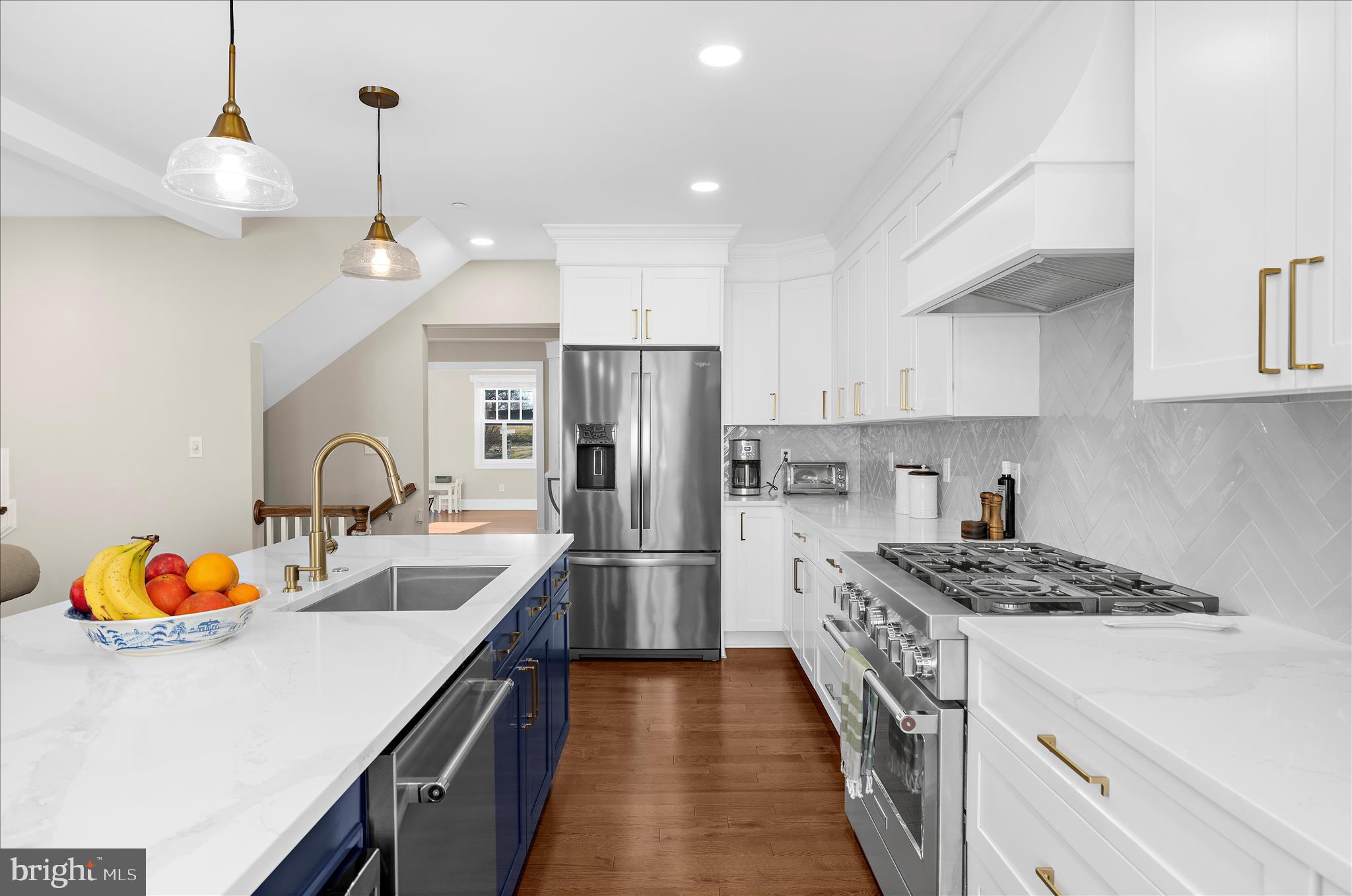 1102 Poplar Avenue Annapolis, MD 21401 - Photo 14 of 125 a kitchen with stainless steel appliances granite countertop a sink refrigerator and microwave