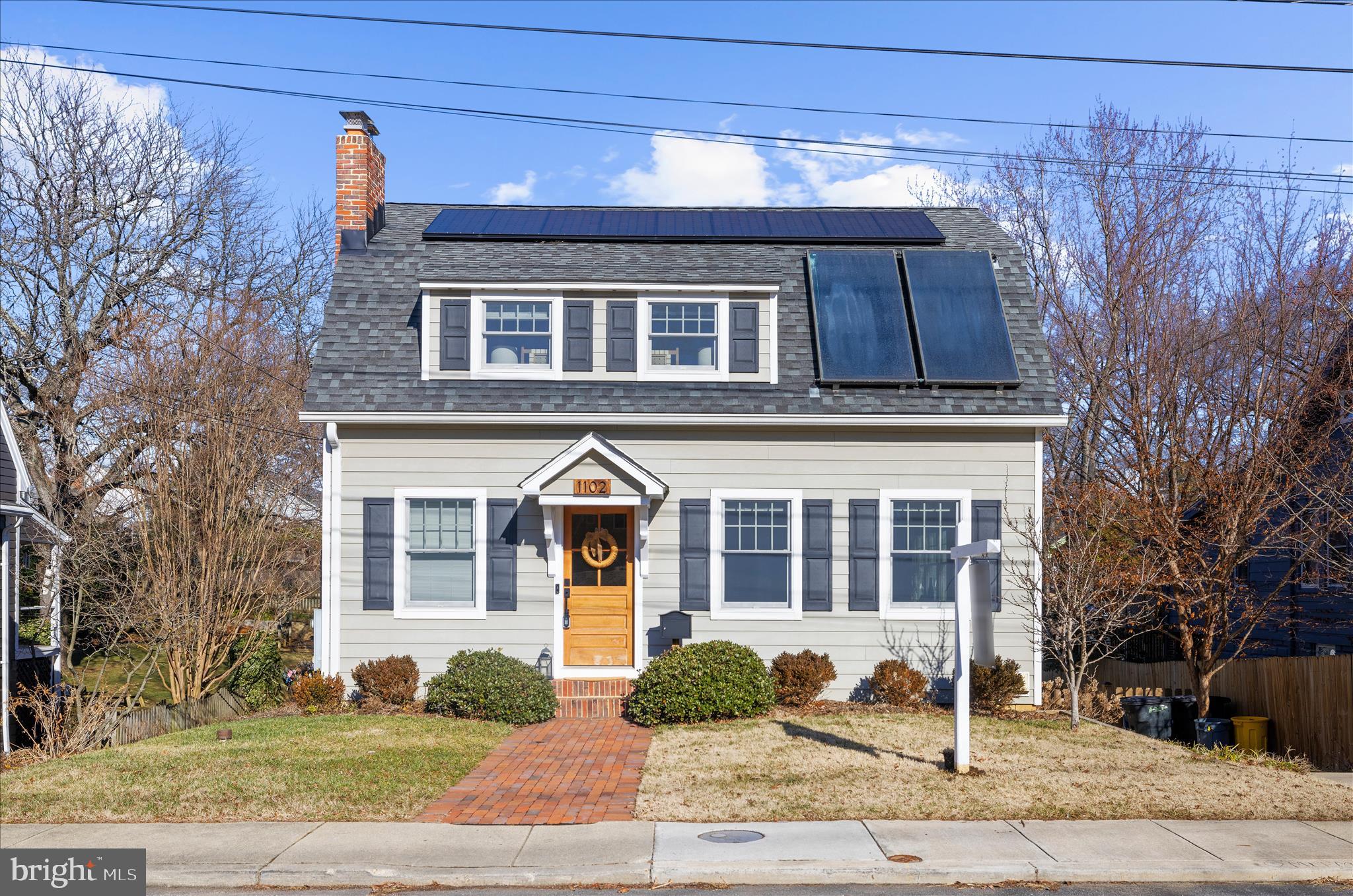 1102 Poplar Avenue Annapolis, MD 21401 - Photo 2 of 125 a front view of a house with a yard