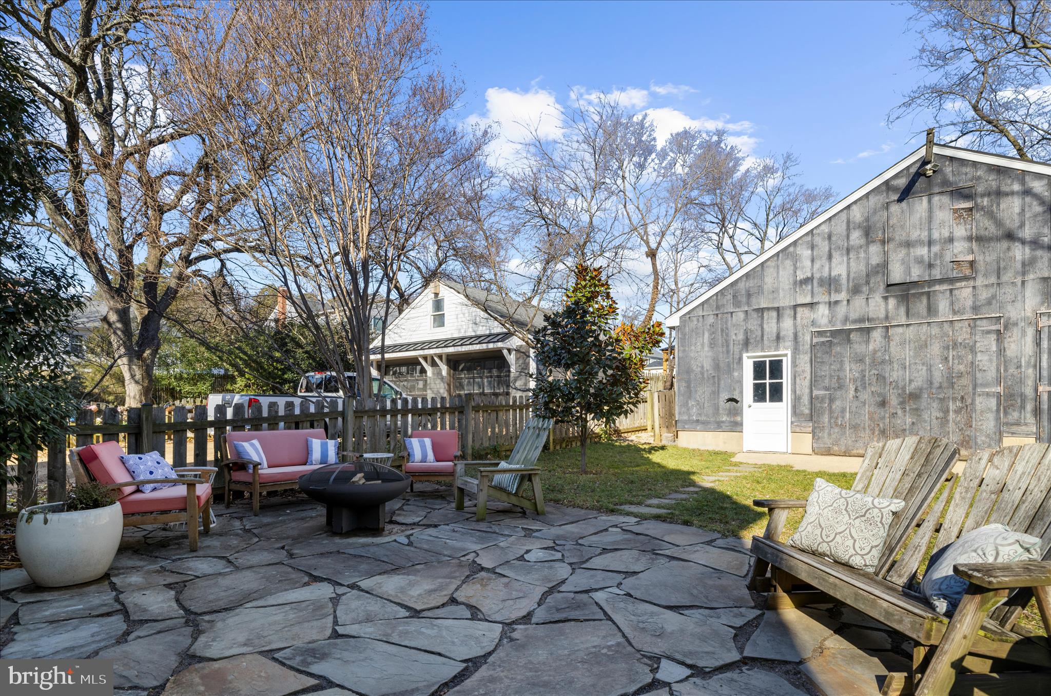 1102 Poplar Avenue Annapolis, MD 21401 - Photo 66 of 125 a view of a patio with couches table and chairs and potted plants