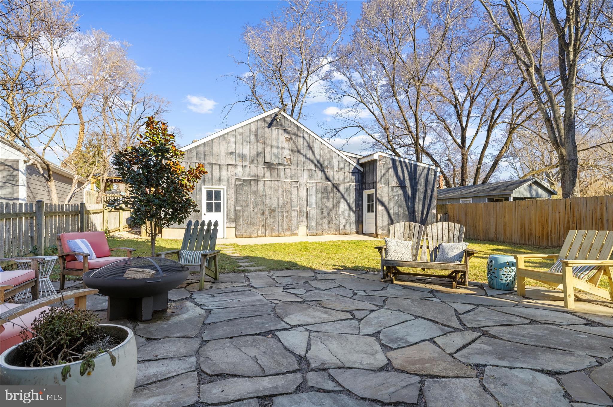 1102 Poplar Avenue Annapolis, MD 21401 - Photo 67 of 125 a view of swimming pool with lounge chair and dinning table under an umbrella