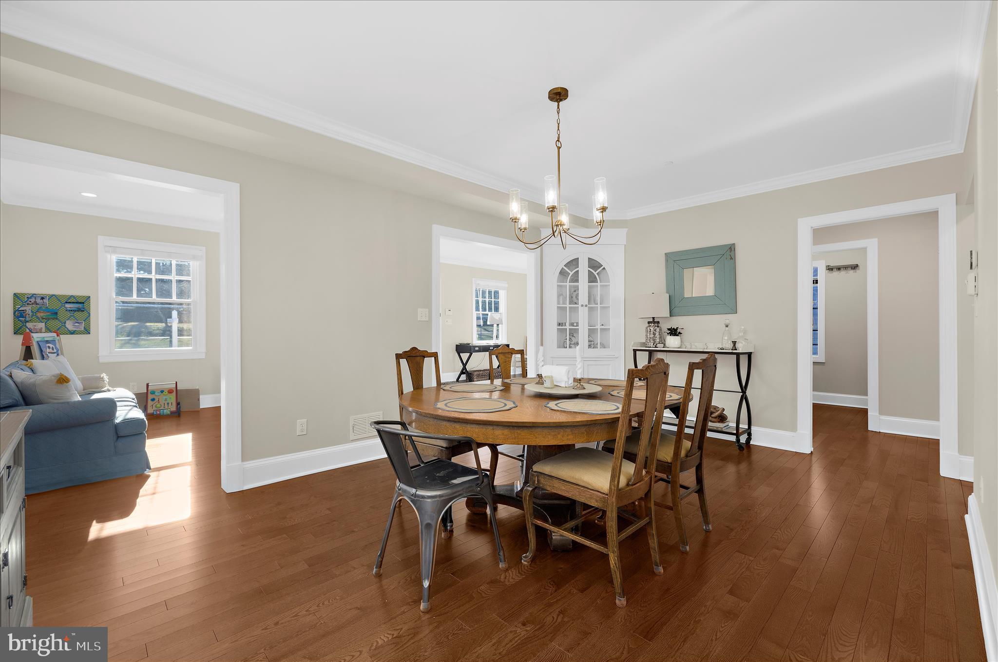 1102 Poplar Avenue Annapolis, MD 21401 - Photo 8 of 125 a view of a dining room with furniture wooden floor and chandelier