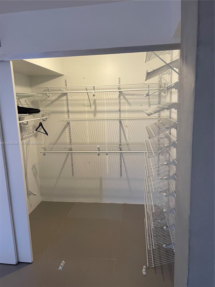 1331 Lincoln Road, Unit 1004 Miami Beach, FL 33139 - Photo 7 of 9 a bathroom with a shower