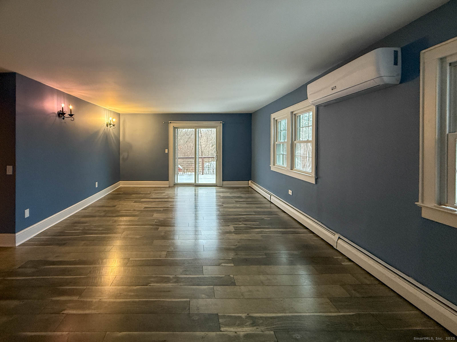 2 Maple Lane New Fairfield, CT 06812 - Photo 20 of 35 a view of empty room with wooden floor and fan