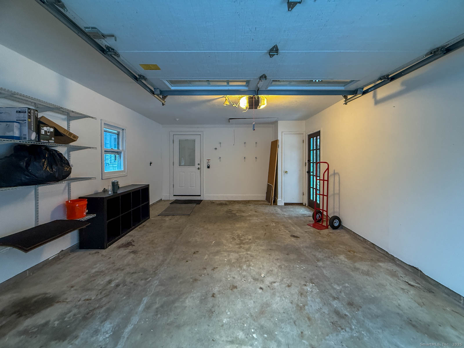 2 Maple Lane New Fairfield, CT 06812 - Photo 31 of 35 a view of empty room with wooden floor and fan