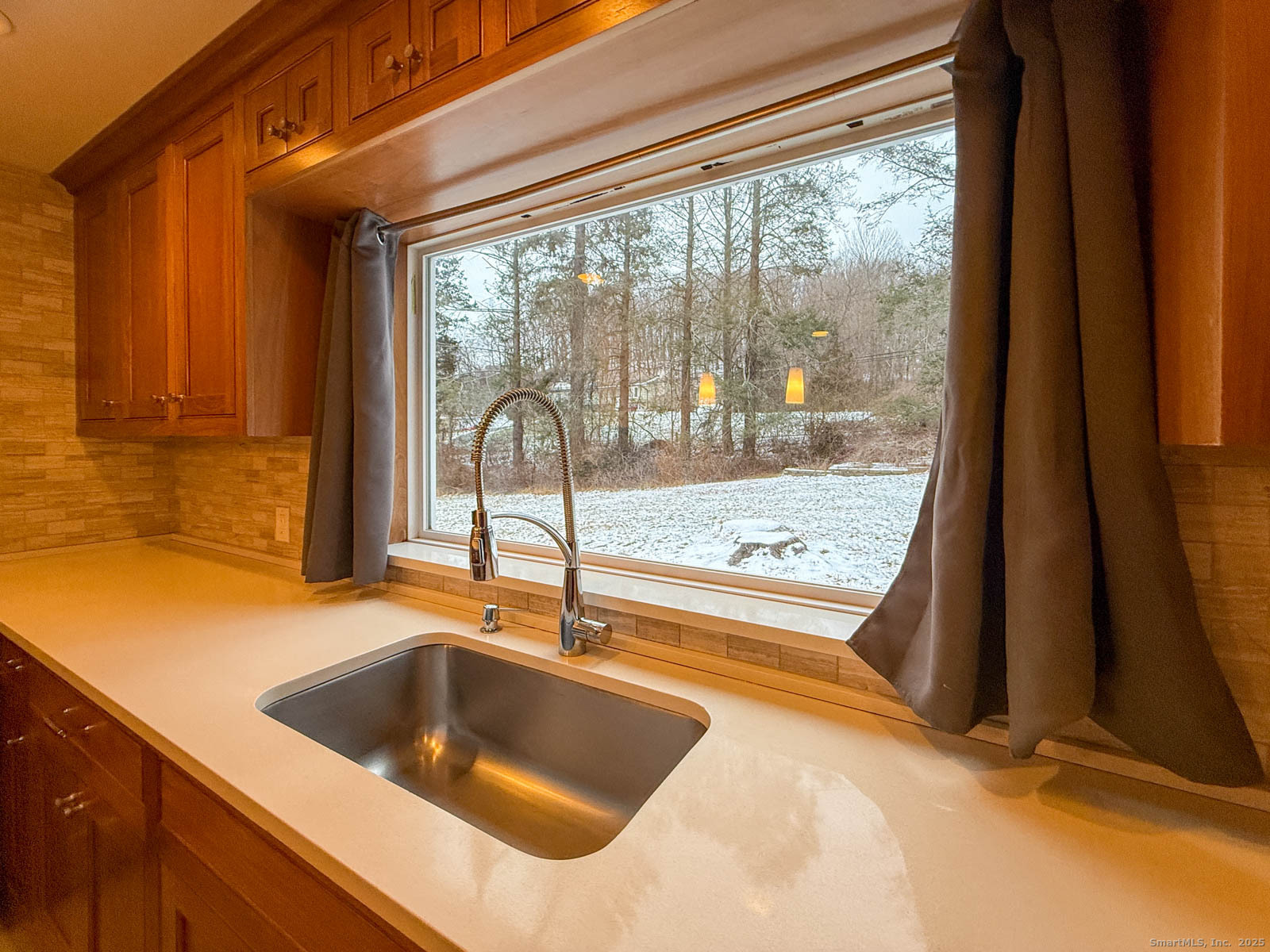 2 Maple Lane New Fairfield, CT 06812 - Photo 7 of 35 a view of a kitchen with a sink and dishwasher with wooden floor