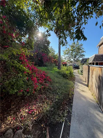 a view of backyard with green space