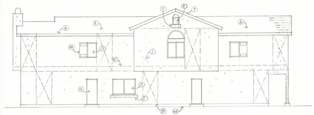 a black and white photo of a living room