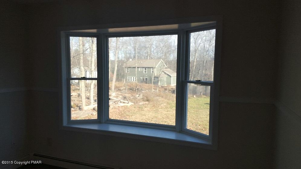 46 Dancing Ridge Road East Stroudsburg, PA 18302 - Photo 13 of 16 a view of an empty room with a window