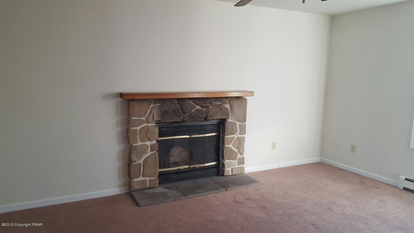 46 Dancing Ridge Road East Stroudsburg, PA 18302 - Photo 4 of 16 a room with a fireplace