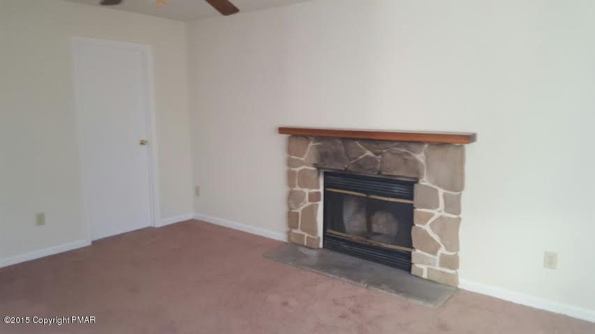 46 Dancing Ridge Road East Stroudsburg, PA 18302 - Photo 5 of 16 a room with a fireplace