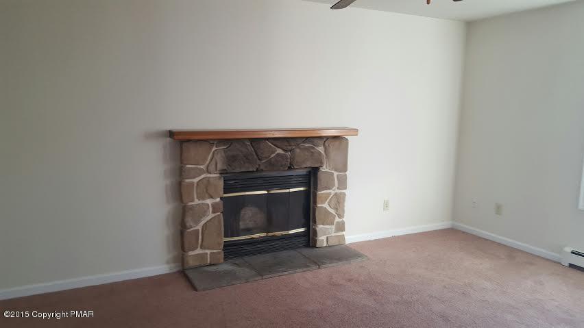46 Dancing Ridge Road East Stroudsburg, PA 18302 - Photo 7 of 16 a room with a fireplace
