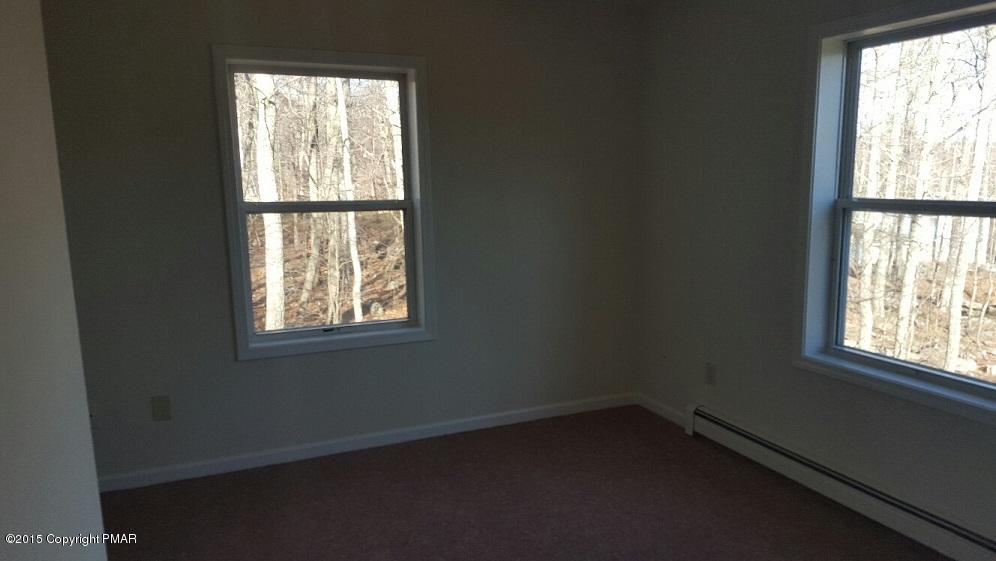 46 Dancing Ridge Road East Stroudsburg, PA 18302 - Photo 9 of 16 an empty room with a window
