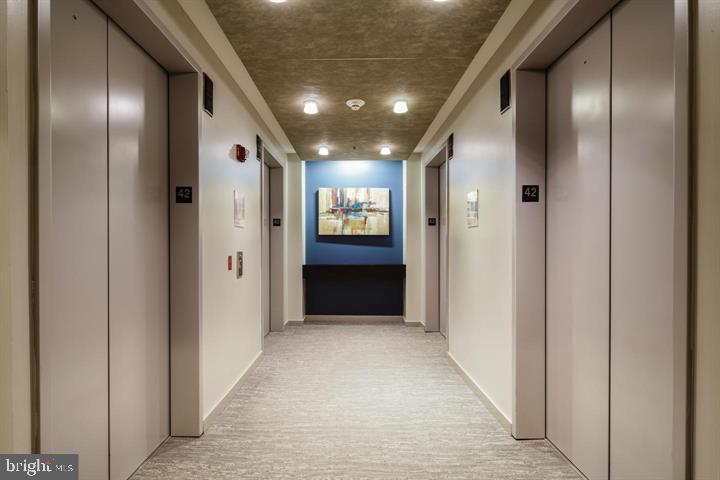 2101 Market Street, Unit 4205 Philadelphia, PA 19103 - Photo 17 of 31 a view of hallway with livingroom