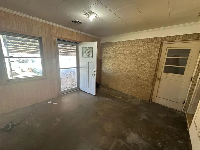 an empty room with windows