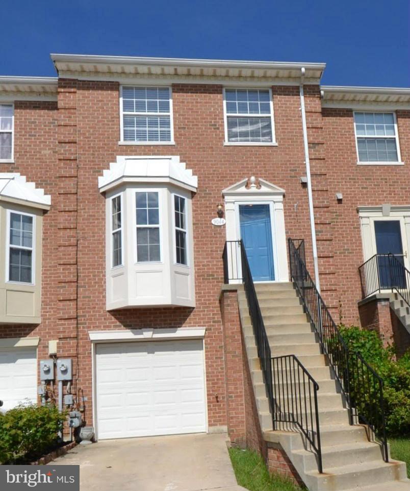 9044 Constant Course Columbia, MD 21046 - Photo 1 of 10 a front view of a house with a yard