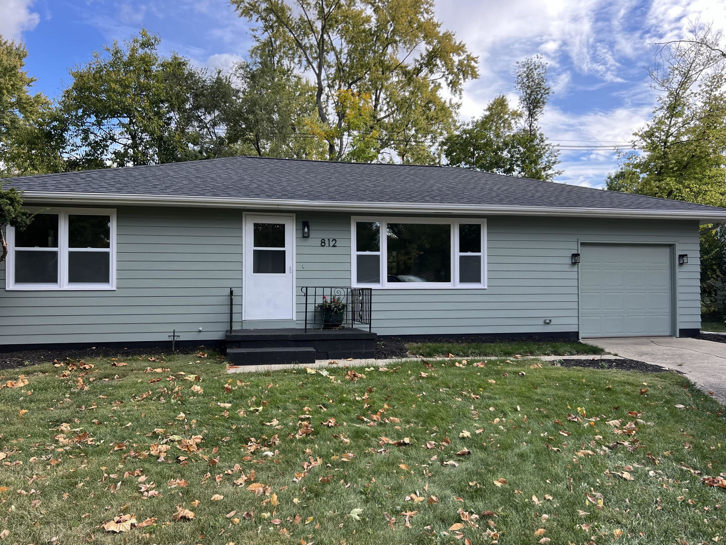 a backyard of a house with lots of green space